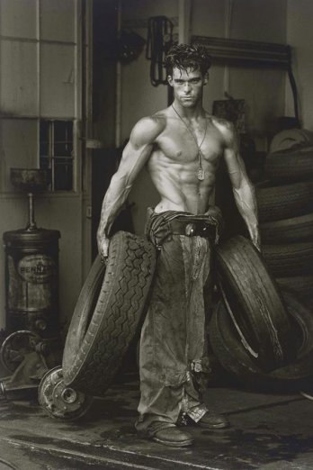HERB RITTS_Fred with Tires, Hollywood, 1984